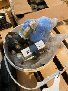 Various Seedhawk parts pail, u-clamps, hubs, bearings